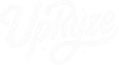 White cursive text on a light background reads UpRyze with “.co” in smaller letters beneath the main word. {{brizy_dc_image_alt imageSrc=